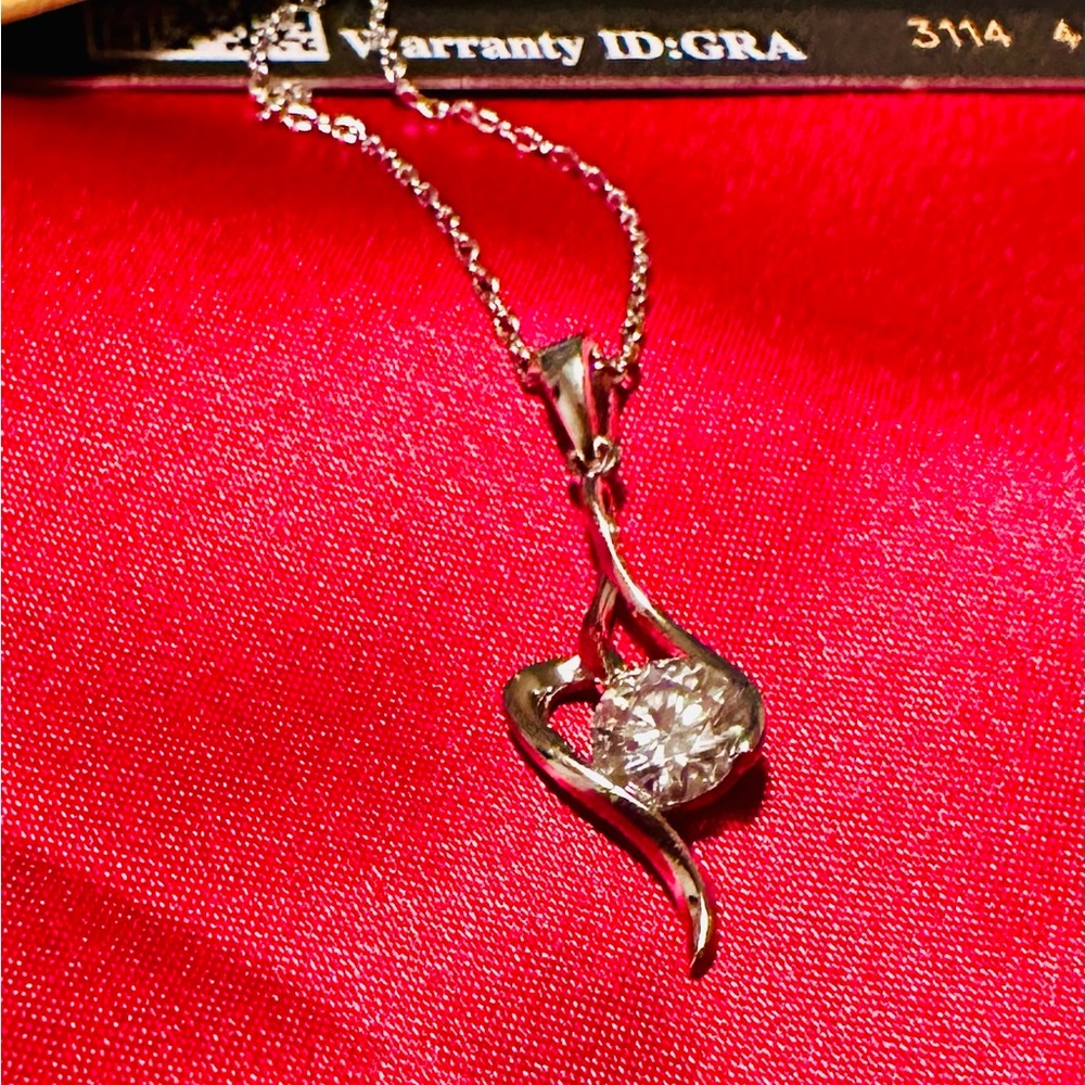 White gold plated necklace with real moissanite.